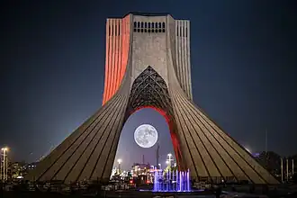 Azadi Tower during a full moon