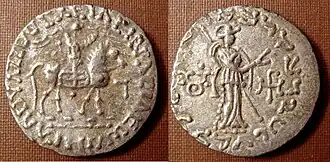 Triratna symbol on the reverse (left field) of a coin of the Indo-Scythian king Azes II (r.c. 35–12 BCE)