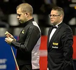 Photo of Hawkins, with a referee