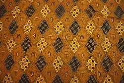 Contemporary inland batik from Solo, Indonesia, with sidha drajat pattern.