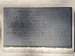 carved stone plaque of grey stone