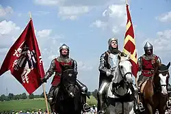 The Lithuanian soldiers with Vytis and the Columns of Gediminas banners during the Battle of Grunwald reconstruction