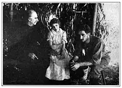 Black and white film still showing actress Bessie Love in period costume