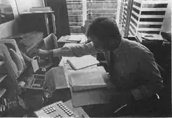 Image 42An American billing clerk preparing a detailed invoice. (1992) (from Medical billing)