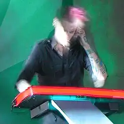 Autrey performing at a Celldweller show in 2010