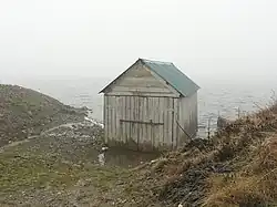 Boathouse, Loch Hoil This hut hasn't really slipped into the water, as it appears here. From the side it can be seen as standing on short posts.