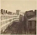 The old Quincy House (center, in front of the Brattle Street Church), c. 1860