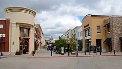 A view of Bridgeport Village looking north near the center of the mall with a Lululemon Athletica store at left and a Madewell store at right