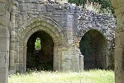 Exterior view through entrances of the two chapels in the south transept.