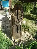 Unusual pillar style khachkar with a Maltese Cross located down the road from the church.