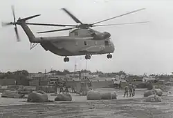 Black and white photograph of a helicopter