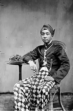 Colonial young man wearing blangkon