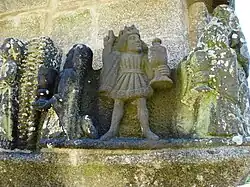 One of the three wise men points up to the star which had led them to the stable.