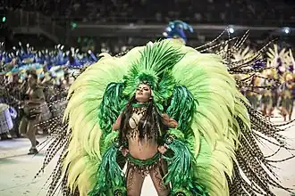 Maria Azêdo was the cunhã poranga of the Boi Caprichoso from 2007 to 2018. Cunhã poranga, a term in the Nheengatu language that means "beautiful woman", represents the indigenous people.