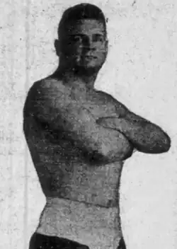 Black and white newspaper photo of Zoll standing shirtless
