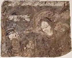 The panel in First Style, with royal donors and Brahmi label.[148]