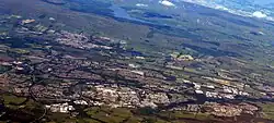 An aerial photo showing Abronhill and Whitelees in Cumbernauld. Westfield, Kilsyth and the Carron Valley Reservoir are also shown.