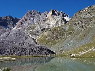 The Aiguille de Chambeyron and the Marinet Lake in the Ubaye Valley