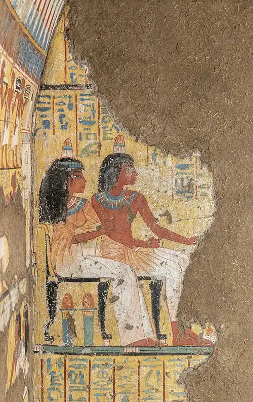 Maya and Tamyt portrayed seated in the back wall painting.