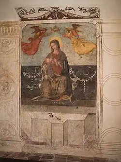 Madonna breastfeeding and two angels