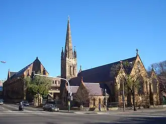 This is a photograph of the Broadway campus with St Benedict's Church, constructed in 1856, in the forefront.