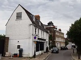 Church Street from the north, with the former post office where Jean-Jacques Rousseau had lodgings, 18th century