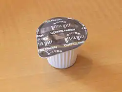 Individual plastic container of coffee creamer, Japan