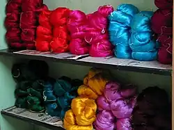 Dyed silk yarns for weaving saris.