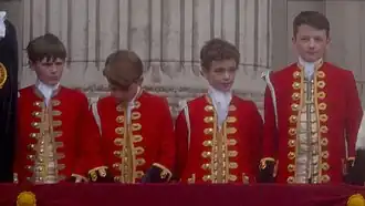 Pages of Honour on the balcony at Buckingham Palace after the 2023 coronation ceremony.