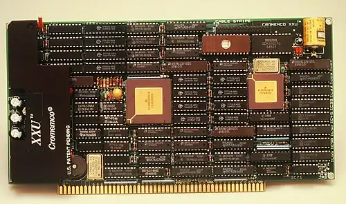 1980s Cromemco XXU, a Motorola 68020 processor S-100 bus card. The axial parts between the ICs are decoupling capacitors.