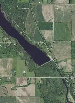 The lower part of the Forestville Millpond and the start of the lower portion of the Ahnapee River; taken June 27, 2020