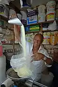 A seller of the nationally renowned and appreciated Cruzeiro do Sul cassava flour