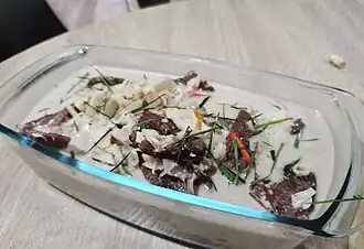 Daging salai masak gulai rebung putih, a smoked beef gulai cooked with white bamboo shoots, commonly found in Malay cuisine