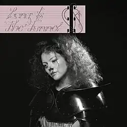 A black-and-white photo of Anna Beckerman wearing armor