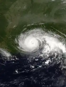 A photograph of a hurricane very close to the coast of Alabama