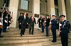 Secretary of Defense Donald Rumsfeld with President George W. Bush, following President Bush's visit to The Pentagon to address military and Department of Defense personnel and sign the Defense Appropriations Bill, January 10, 2002