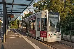 Two-section low-floor tram at tram stop