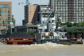 Towboat Donna York pushing barges of coal up the Ohio River at Louisville, Kentucky, United States