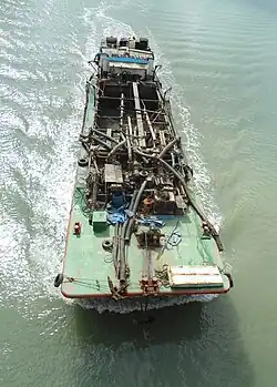 Top view of a suction dredger on the Nandu River, Hainan, China
