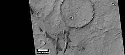 Dunes and craters, as seen by HiRISE under HiWish program Some of the dunes are barchans.