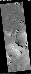Layers under top layer of pedestal crater, as seen by HiRISE under HiWish program
