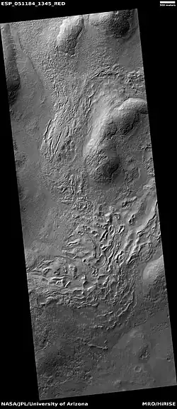 Wide view of hollows, as seen by HiRISE under HiWish program. Hollows may be formed as ice leaves the ground.