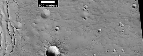 Close view of cracks of various sizes, as seen by HiRISE under HiWish program. Ice disappears along crack surfaces and makes crack larger. Note that small craters do not have very big rims; they may be just pits.