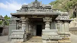 Porch entrance to Akkana Basad with the awning supported by half pillars with old Kannada inscription on the side.