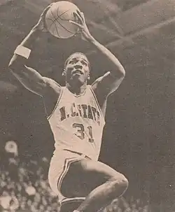 Basketball player with a ball in hand