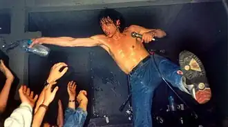 Evaristo performing in a concert