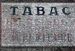 French painted mural advertisement