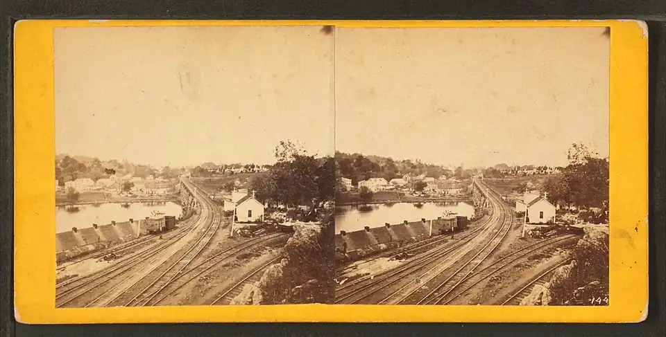 Falls of Schuylkill, from the western side of the river. Philadelphia and Reading Railway Bridge is at center. Laurel Hill Cemetery is visible at upper right.