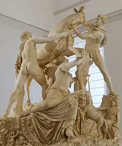 An oblique front view of the Farnese Bull. Note that lighting greatly affects the appearance of the marble.