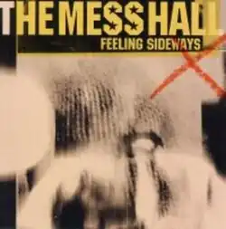 The main subject is a blurred image, possibly of a pair of hands at the face of a dog. Across the top is the group's name in large block capitals, mostly in yellow print. Below in smaller yellow block capitals is the ep's name. At the top right, over the last part of the title and below is a crayon-like red X.